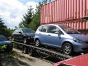 zweiachsiger Trailer, beladen mit einem Honda �Jazz??? und einem  schwarzem BMWzweiachsiger Trailer, beladen mit einem Honda �Jazz??? und einem schwarzem BMW, Foto: PD Stralsund